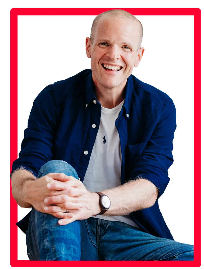 Roberto UK Radio Presenter and Voiceover Artist Image of Roberto the UK radio presenter as heard on Heart FM and Capital FM. He is sitting with his had around his right knee, wearing a blue shirt with white t-shirt underneath, smiling at the camera.